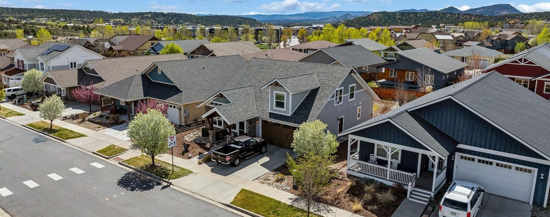 Three Springs Durango family homes with two-car garages and front porches — 3 and 4 bedroom floor plans